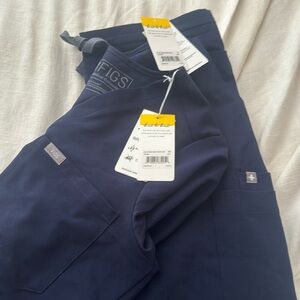 Navy blue Figs scrub set . Catarina shirt with high waisted yola scrub pants.